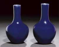 Kangxi A pair of deep blue glazed bottle vases
